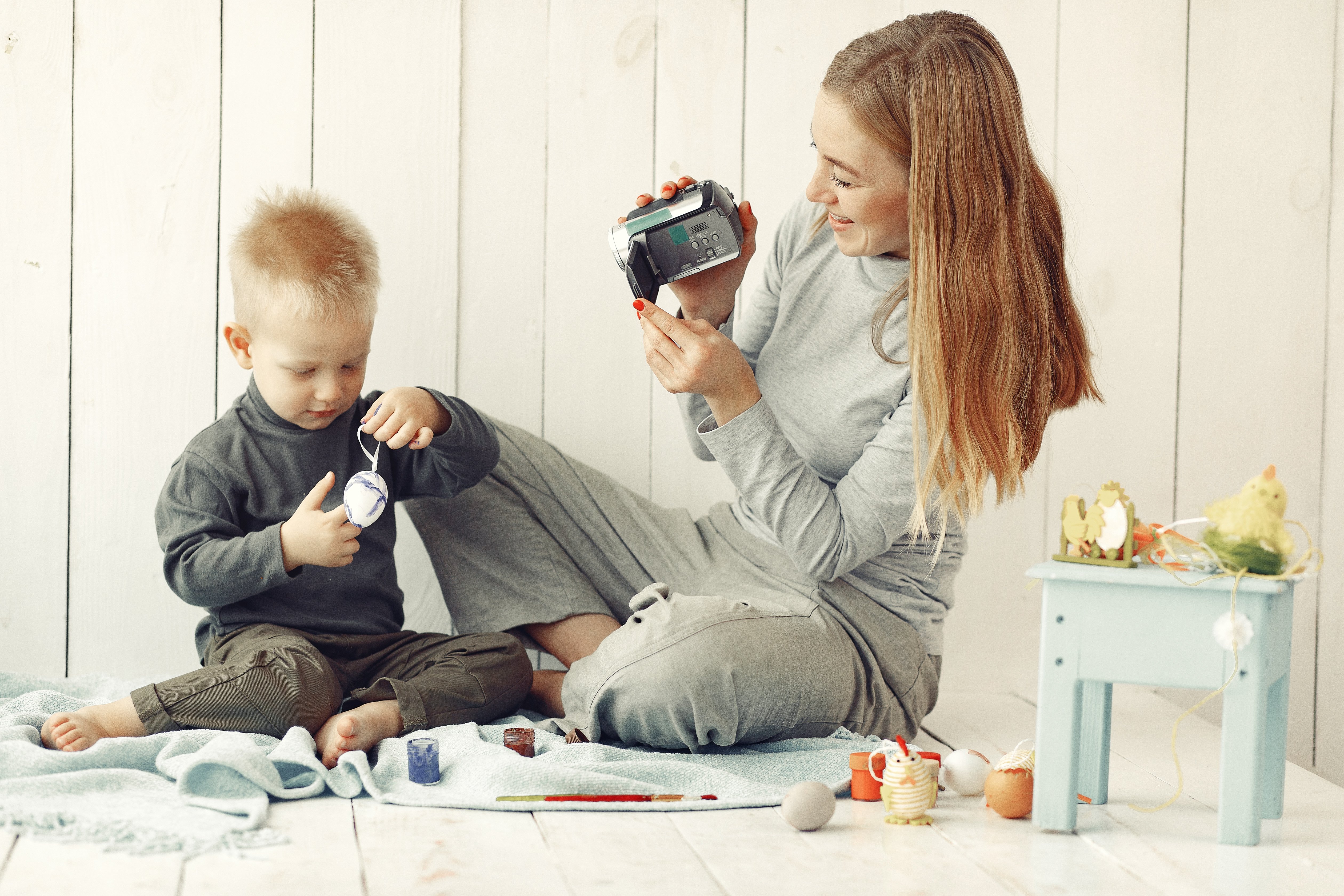 Babysitter doing fun activities with a young child