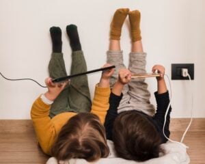 Children learning electrical safety at home